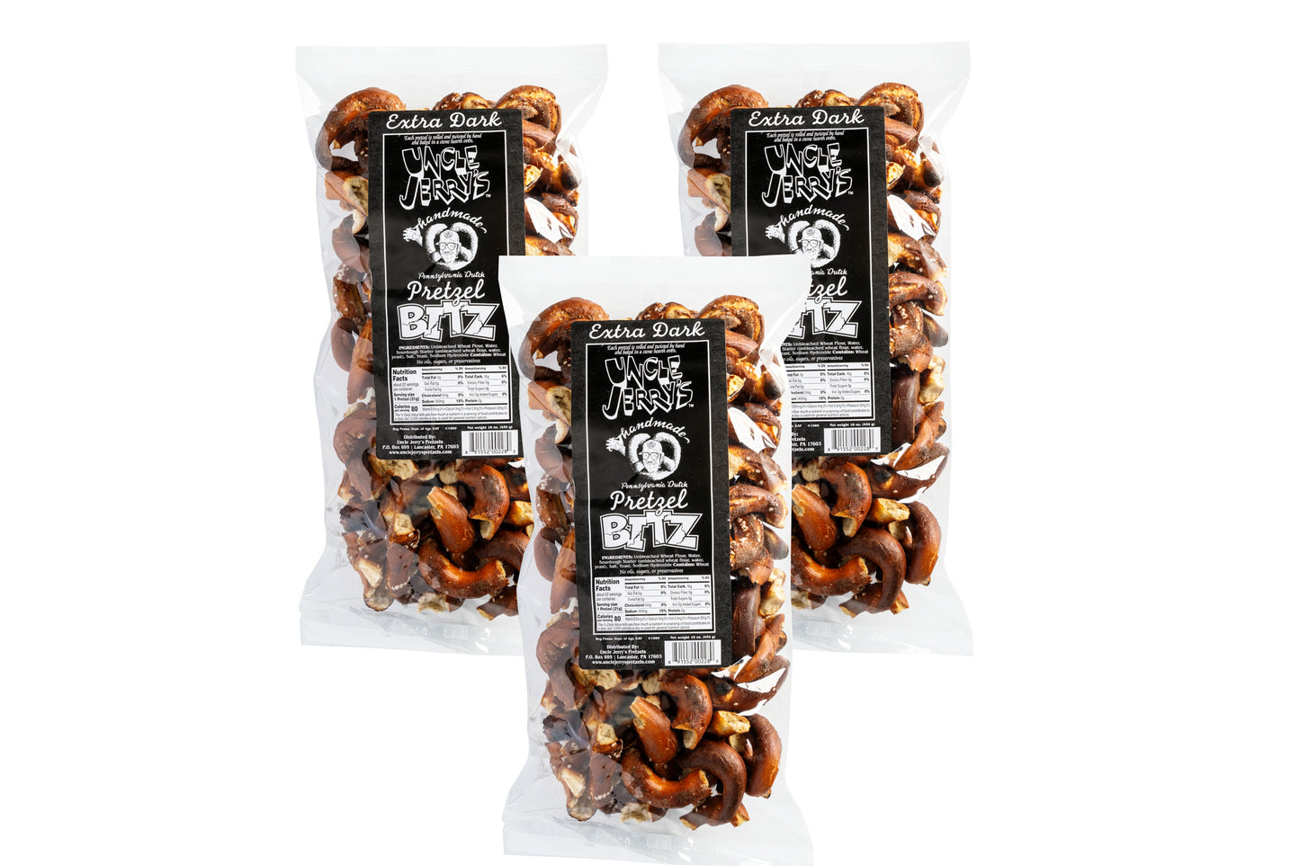 Three bags of Uncle Jerry's Extra Dark Pretzel Bits with regular salt in 16 oz packaging