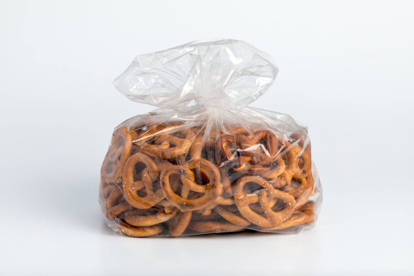 Clear plastic bag filled with whole wheat pretzels