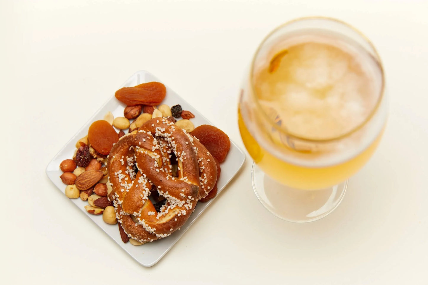 Pretzel with nuts and drink